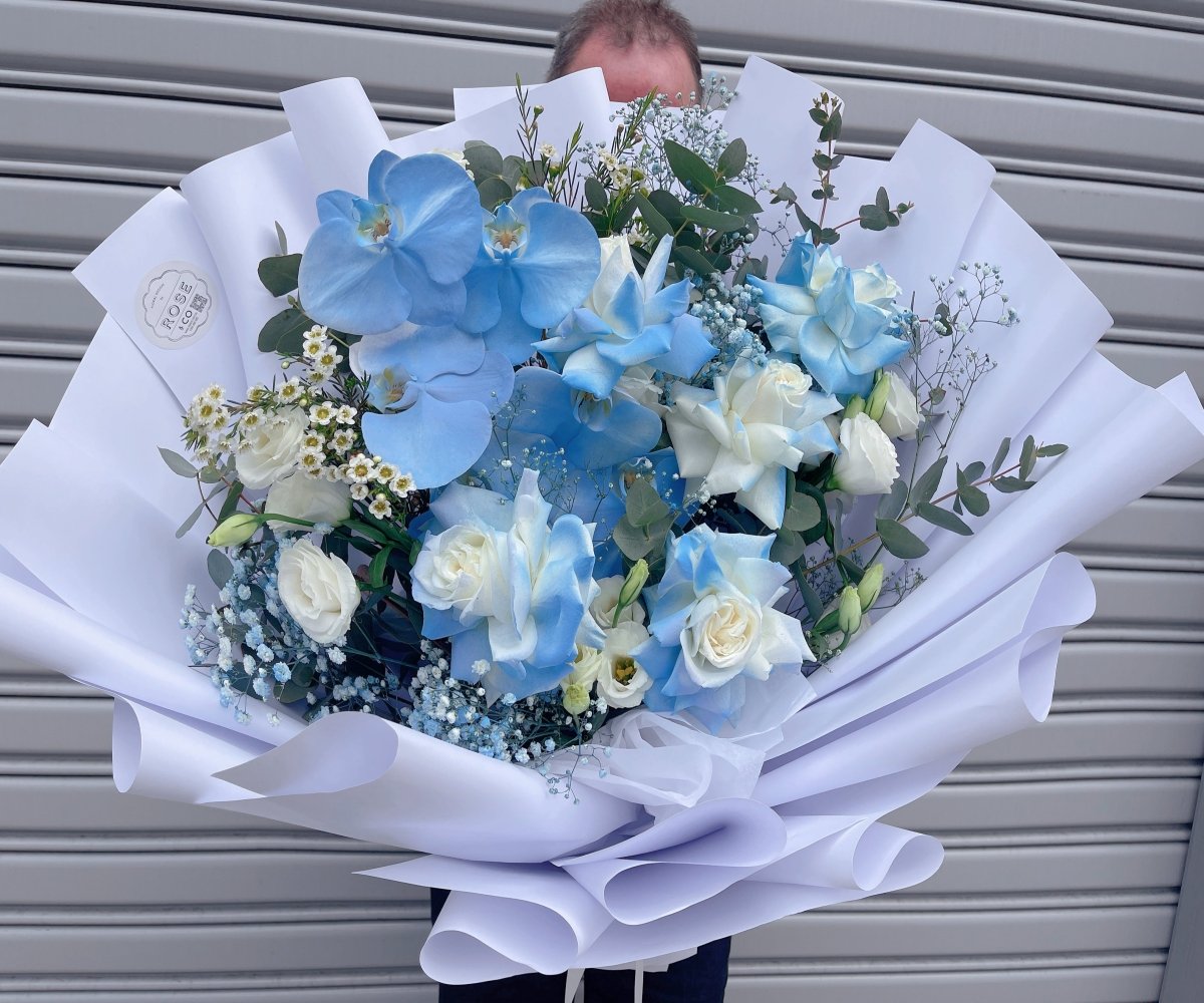 Graduation Bouquet with blue cut phalaenopsis - ROSE &amp; CO
